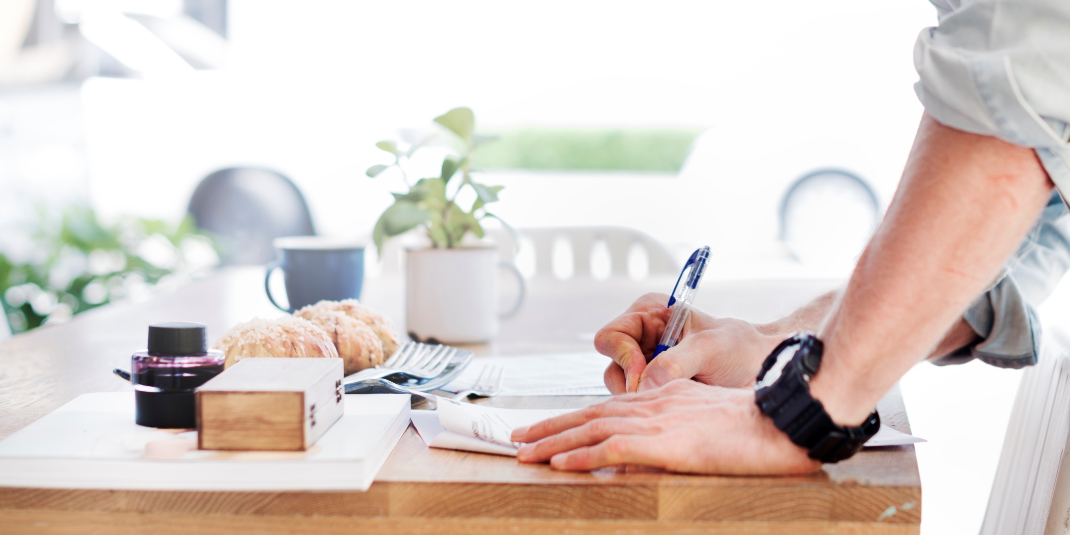 Man Writing Document Dinning Table Concept